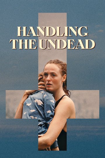 Anna holding her son