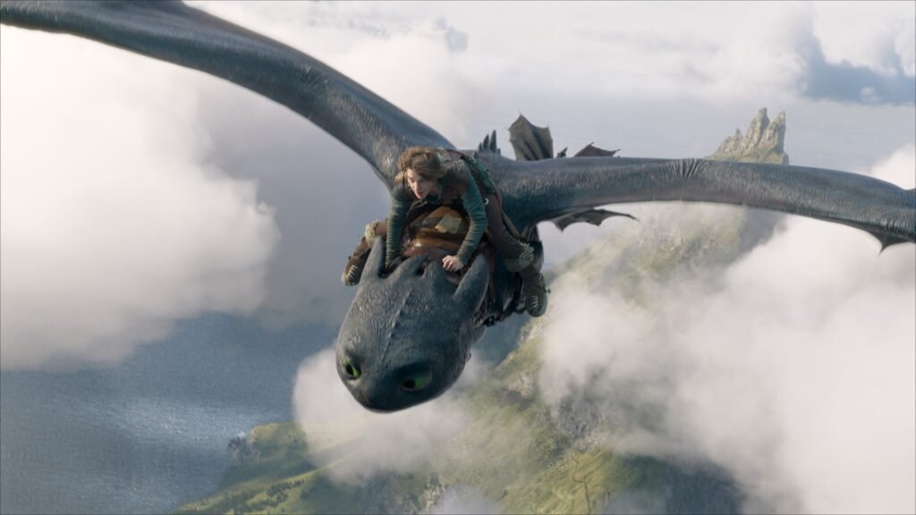Hiccup riding Toothless in the sky