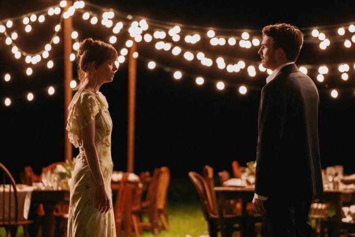 Lucy and Harry at an outdoor wedding.